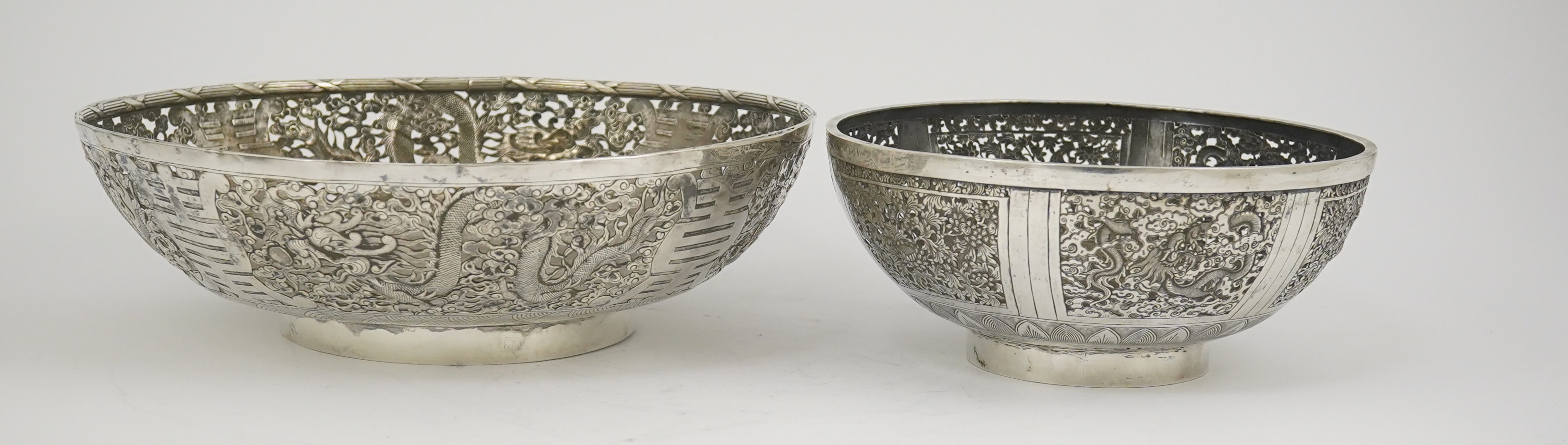 Two early 20th century Chinese Export pierced silver circular bowls